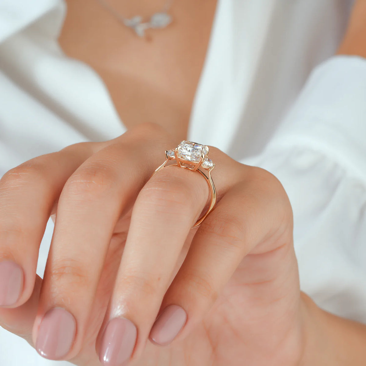 Cushion Cut Lab Grown Diamond Four Prong Three Stone Engagement Ring with Half Moon Side Diamonds in Gold or Platinum