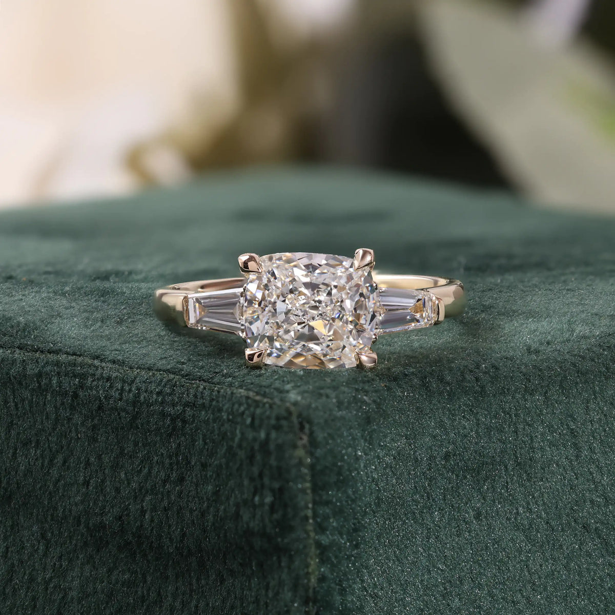 Cushion Cut Diamond Three Stone Ring with Tapered Baguettes