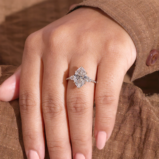 Marquise Diamond Ring with Trillion and Round Side Clusters