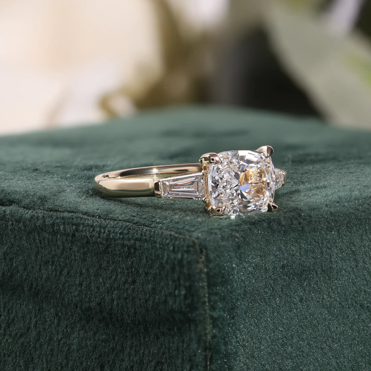 Cushion Cut Diamond Three Stone Ring with Tapered Baguettes