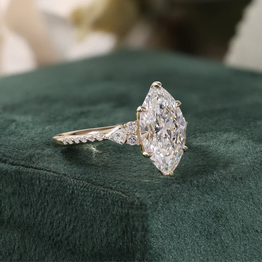 Marquise Diamond Ring with Trillion and Round Side Clusters