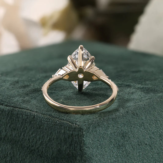 Marquise Diamond Ring with Trillion and Round Side Clusters