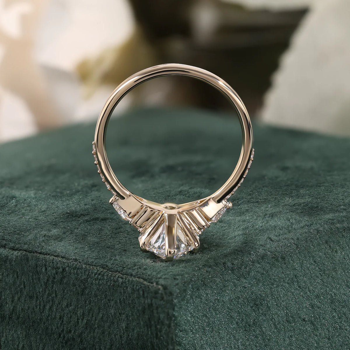 Marquise Diamond Ring with Trillion and Round Side Clusters