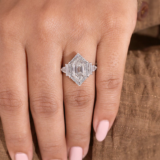 Hexagon Cut Diamond Halo Ring with Trapezoid and Pear Side Stones