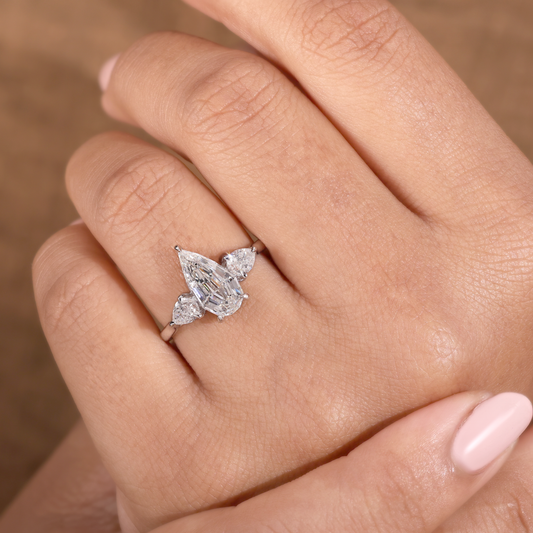 Kite Cut Diamond Ring with Pear Side Stones, Winged Gallery