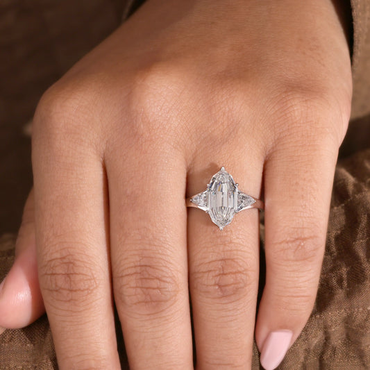 Elongated Hexagon Diamond Ring with Pear Side Stones