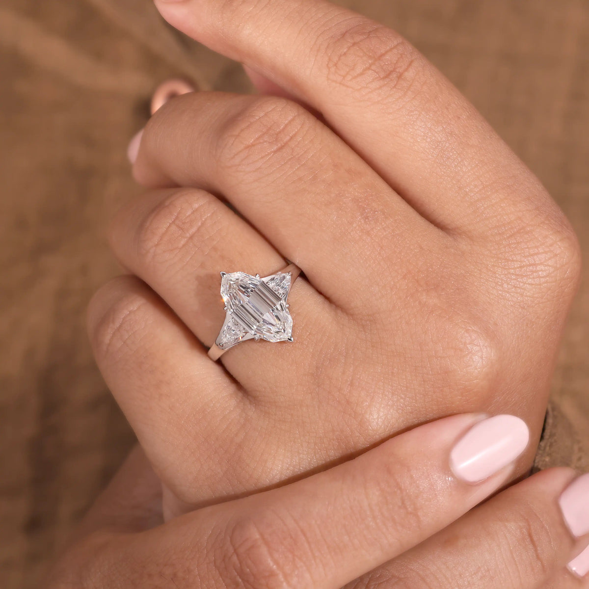 Elongated Hexagon Diamond Ring with Pear Side Stones