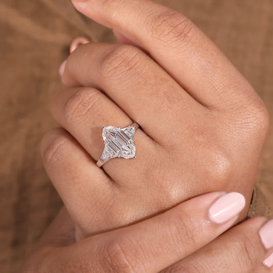 Elongated Hexagon Diamond Ring with Pear Side Stones