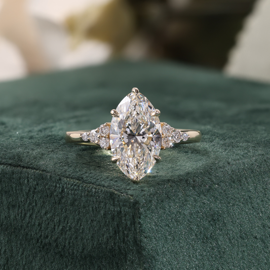 Marquise Diamond Ring with Trio Cluster Side Stones
