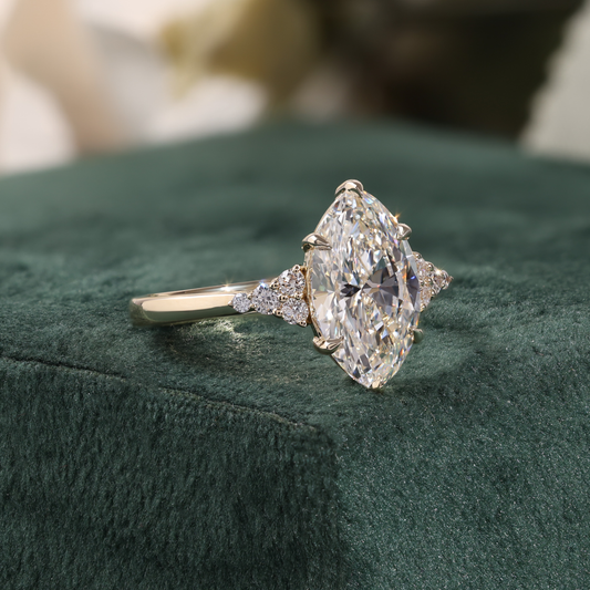 Marquise Diamond Ring with Trio Cluster Side Stones