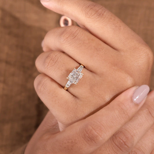 Cushion Cut Diamond Three Stone Ring with Tapered Baguettes