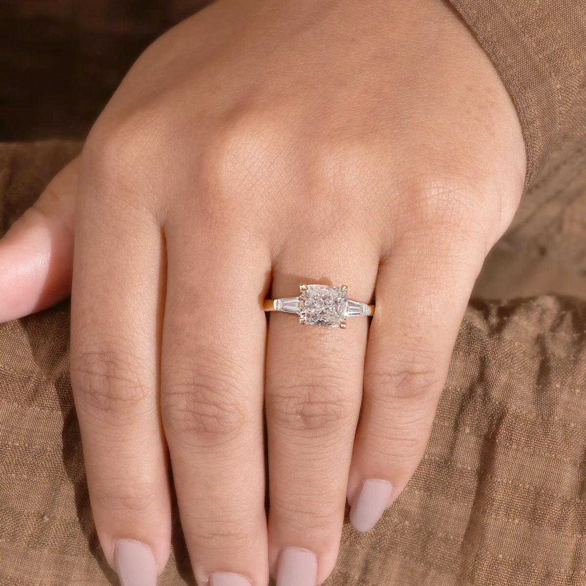 Cushion Cut Diamond Three Stone Ring with Tapered Baguettes