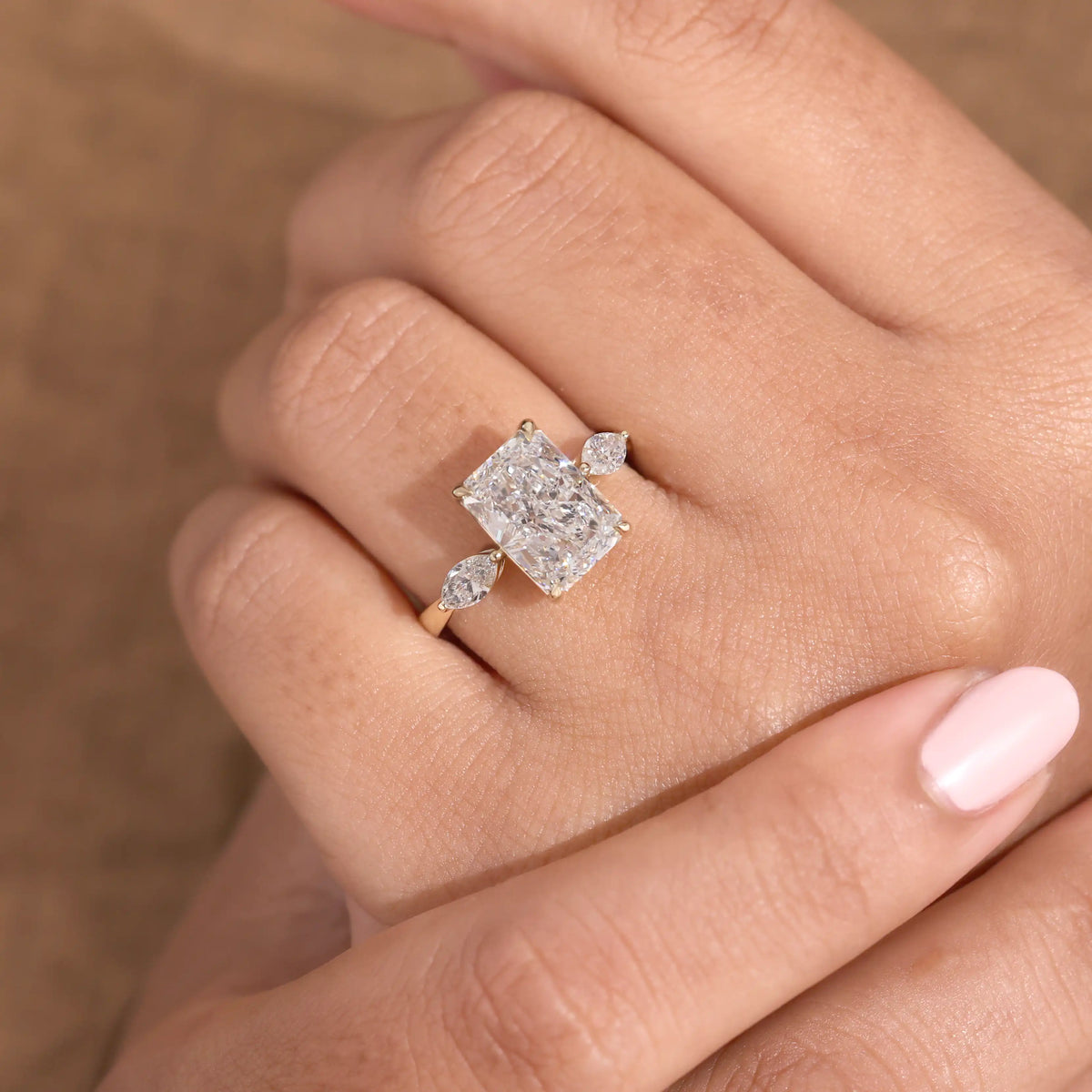 Radiant Cut Lab Grown Diamond Engagement Ring with Pear Shaped Side Stones