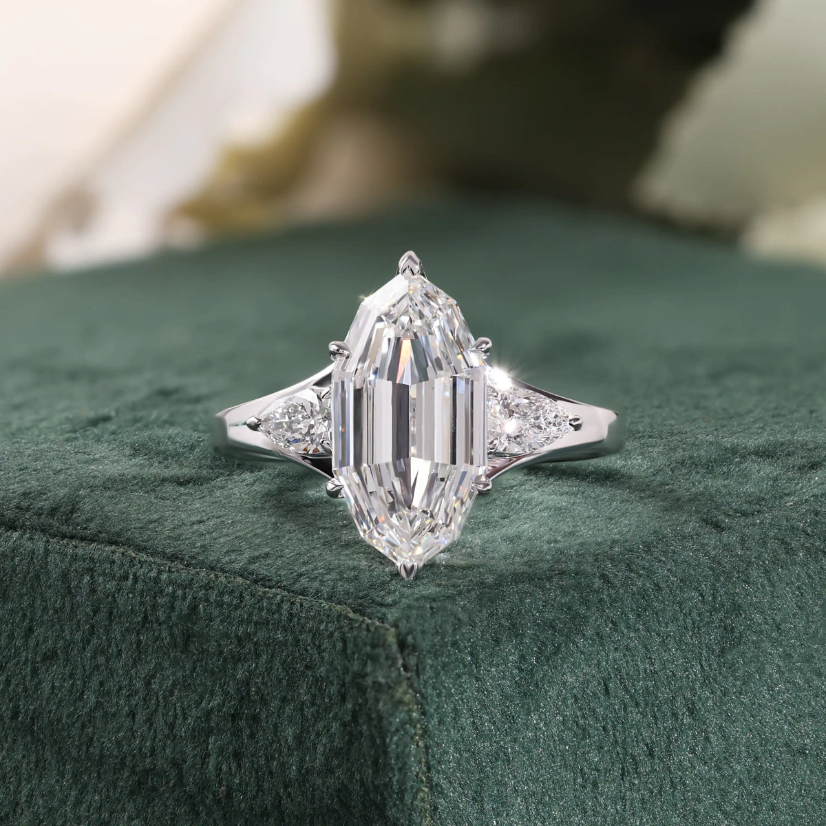 Elongated Hexagon Diamond Ring with Pear Side Stones