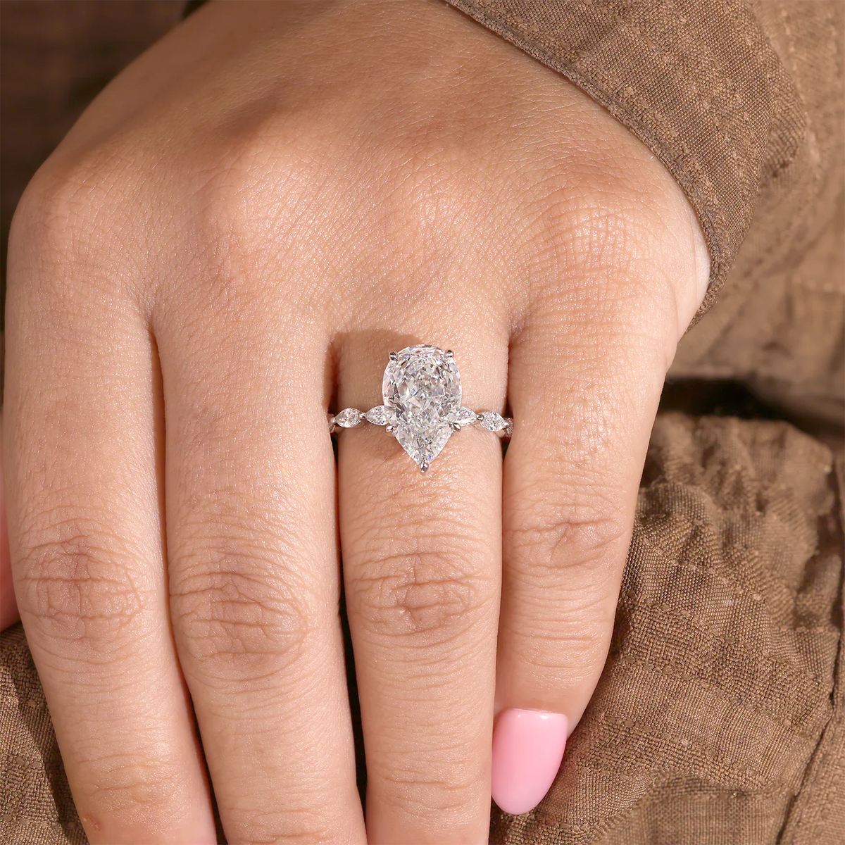 Pear Cut Lab Grown Diamond Hidden Halo Engagement Ring with Marquise Station Band