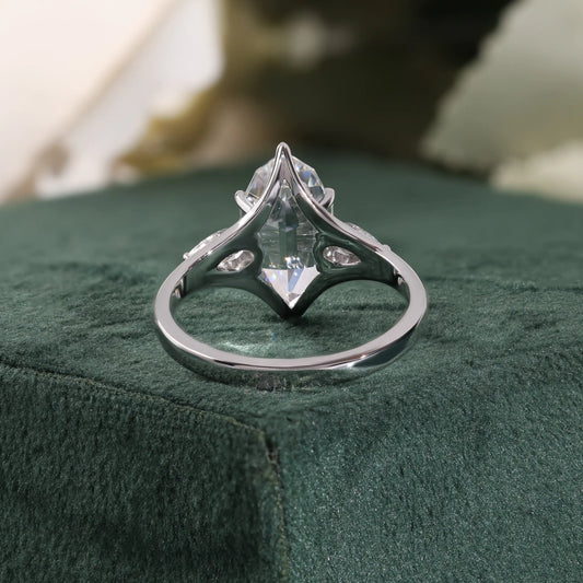 Elongated Hexagon Diamond Ring with Pear Side Stones