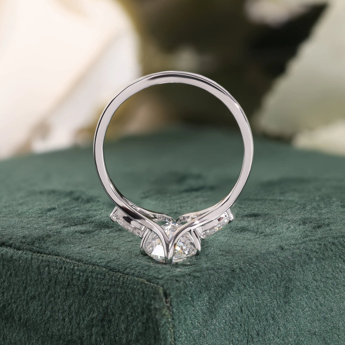 Elongated Hexagon Diamond Ring with Pear Side Stones