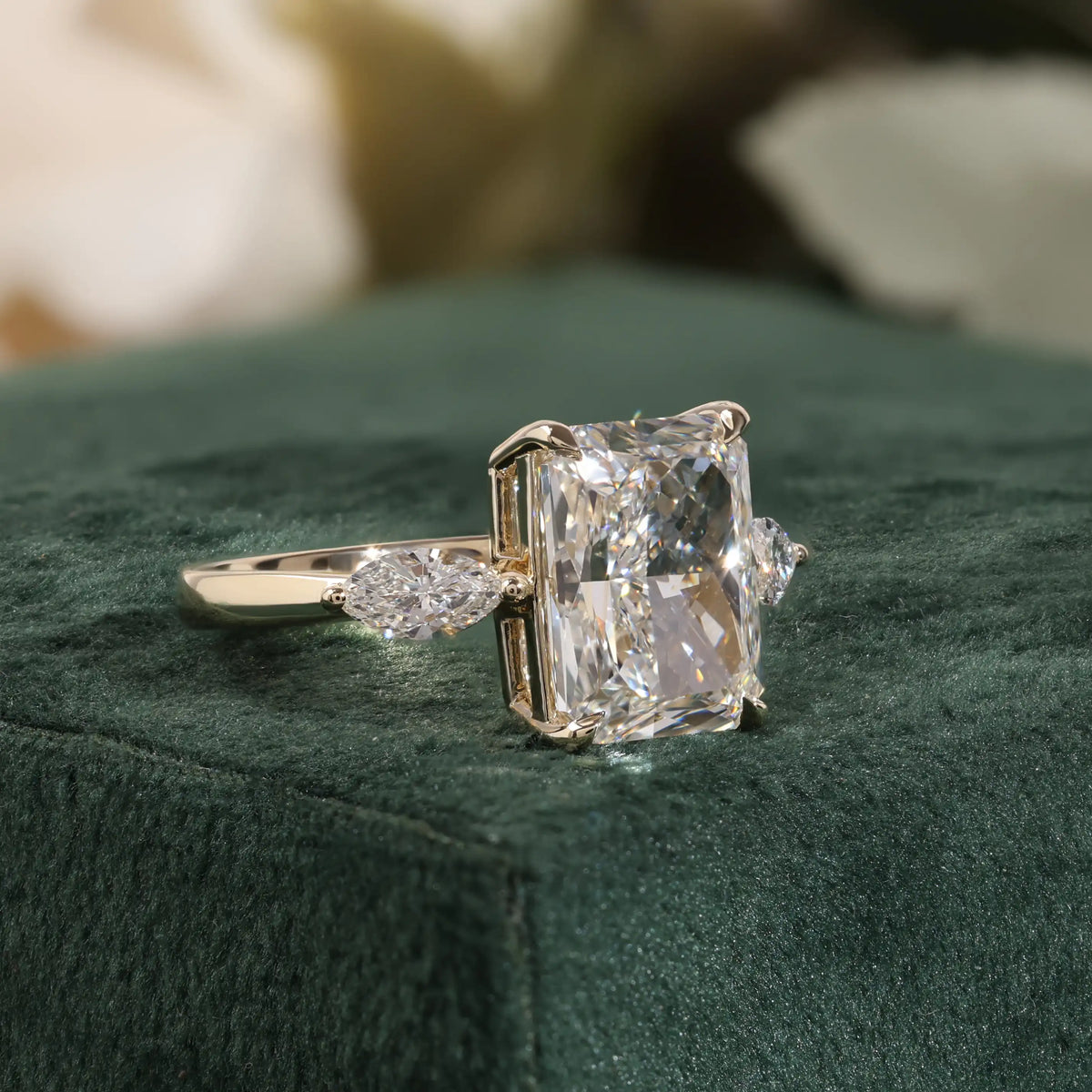 Radiant Cut Lab Grown Diamond Engagement Ring with Pear Shaped Side Stones