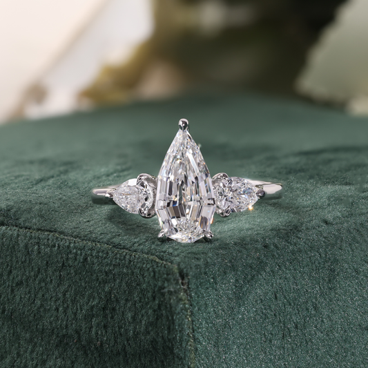 Kite Cut Diamond Ring with Pear Side Stones, Winged Gallery