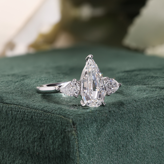Kite Cut Diamond Ring with Pear Side Stones, Winged Gallery