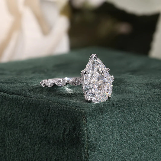 Pear Cut Lab Grown Diamond Hidden Halo Engagement Ring with Marquise Station Band