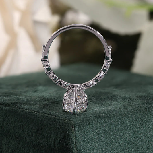 Pear Cut Lab Grown Diamond Hidden Halo Engagement Ring with Marquise Station Band